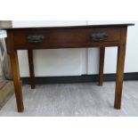 A George III mahogany single drawer side table, raised on square,