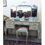 A modern Maple, Continental style, cream painted mahogany five drawer kneehole dressing table,