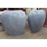 A pair of speckled grey and white enamelled ceramic,