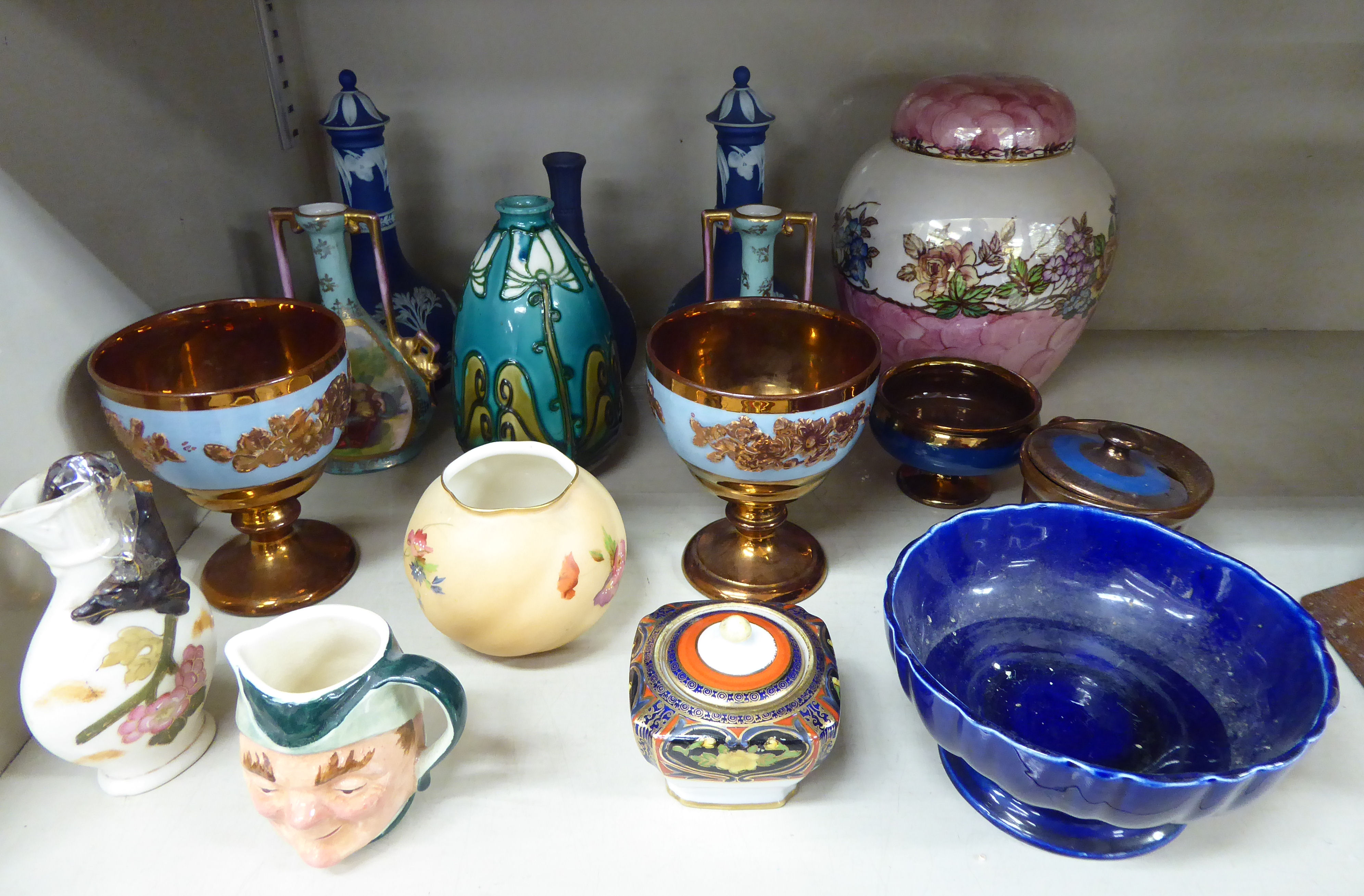 Decorative ceramics: to include a pair of late Victorian Wedgwood jasperware vases and covers,