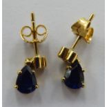 A pair of gold coloured metal sapphire and diamond set drop earrings 11