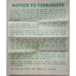 Poster. NOTICE TO TERRORISTS1 poster printed in green on a cream background warning terrorist how to