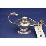 An Edward VII silver Roman pattern table lighter by Synyer & Beddoes, Birmingham 1901, 3.4oz.