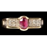 A ruby and diamond ring, the oval facet cut ruby within part collet setting,