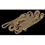 A yellow metal muff chain, of beaded fancy links, 150cms long, 54grms.