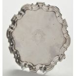 A George II silver waiter, by George Bulman, Newcastle 1741, shaped circular, raised on scroll feet,