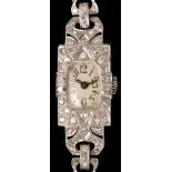 An Edwardian diamond and white metal cocktail watch,