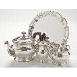 A George VI three-piece silver tea service, by Adie Bros. Ltd.