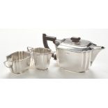 An Edward VIII three piece silver tea service, by Henry Clifford Davis, Birmingham 1936,