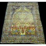 A Lava Kirman rug, with tree of paradise design including birds and blossom, 218 x 137cms.