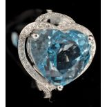 A blue topaz and diamond cluster ring,
