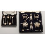 A George V silver condiment set, by Adie Bros. Ltd.