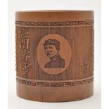 Carved Chinese bamboo bitong, with oval portrait of Chairman Mao between script panel,