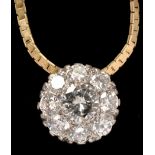 A diamond cluster pendant, the central brilliant cut diamond weighing approximately 0.