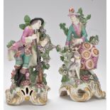 Pair of soft past porcelain figures of huntsman and companion,