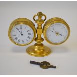 An early 20th Century gilt metal desktop clock/barometer,