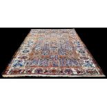 A Persian Bakhtiari carpet, decorated with panels of floral motifs, 290 x 210cms.