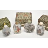 Four Chinese interior painted glass snuff bottles and stoppers, with landscapes,