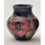 Moorcroft 'Pansy' squat vase, on mottled blue ground, height 8cm, impressed "MOORCROFT",