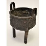 Chinese bronze tripod censer, of archaic form, the flattened rim with two loop handles above,