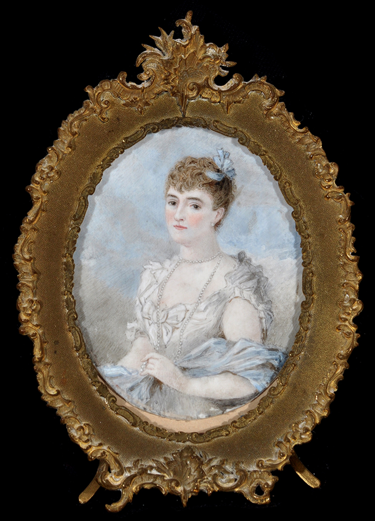 19th Century British School A miniature half-length portrait of a young woman in white evening