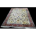 A Tabriz carpet, with full floral scrolling design on ivory ground, 358 x 248cms.