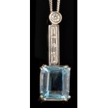 An aquamarine and diamond pendant, the rectangular facet cut aquamarine weighing approximately 4.