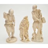 Japanese ivory Meiji period okimono of a fisherman, hauling in his catch,