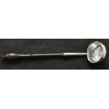 A George II silver toddy ladle, by Starling Wilford, London 1733, with turned wooden handle.