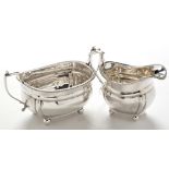 A George V silver sugar bowl and cream jug, by Robert Stewart, London 1927,