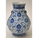 Chinese blue and white baluster vase, with lotus scrolls enclosing flowers,