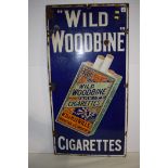 'Wild Woodbine Cigarettes' enamel advertising sign, by The Imperial Tobacco Co. Ltd., 46 x 92cms.