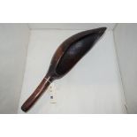 A West African carved wood scoop, 43cms.