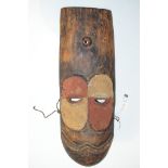 A Central African elongated tribal mask, probably from the Congo, 53cms.