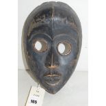 A West African Dan mask, 22cms.