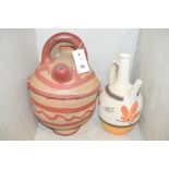African pottery jugs with hand-painted decoration.