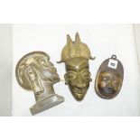West African tribal items, to include: a carved hardstone bust; a cast metal mask; and another.