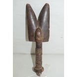 A West African Yoruba Shango carved wooden dance wand, Janus form, 21.5cms.