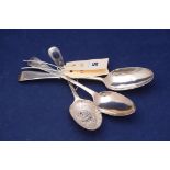 A George III silver dessert spoon, by Thomas Wallace I, London 1777; and two others, 5.2oz.