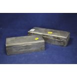 Two silver mounted cigarette boxes, each with engraved initials.