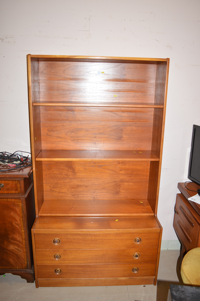 A teak open bookcase, fitted three shallow drawers in the base, 92cms.