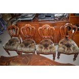 Four Victorian mahogany balloon back dining chairs,