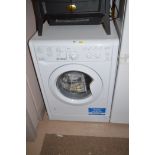An Indesit automatic washing machine.