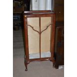 Glazed walnut display cabinet, plate glass shelves, 58cms wide.