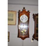 A modern mahogany three train drop dial wall clock by Comitti London, 1cm.