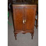 Mahogany converted radiogram cabinet with two doors, 62cms wide.