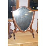 An Edwardian mahogany shield shaped toilet mirror, 41cms wide.