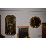 Georgian style walnut and parcel gilt wall mirror together with a circular wall mirror.