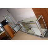 Two plated glass glazed display cases with sliding doors,