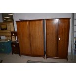 A Stag mahogany bedroom suite comprising:ladies and gents wardrobes, chest of drawers,